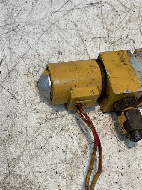 new holland l555 skid steer tandem drive pump|new holland l555 boom solenoid.